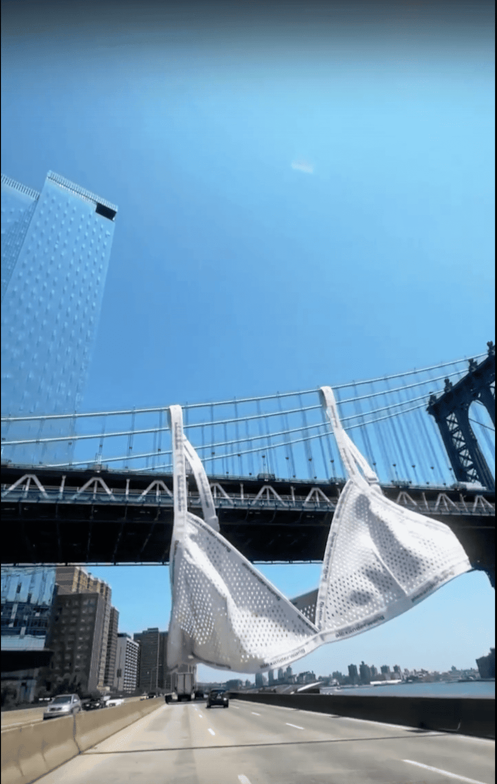 A giant Alexander Wang Underwear bra above the bridge in New York