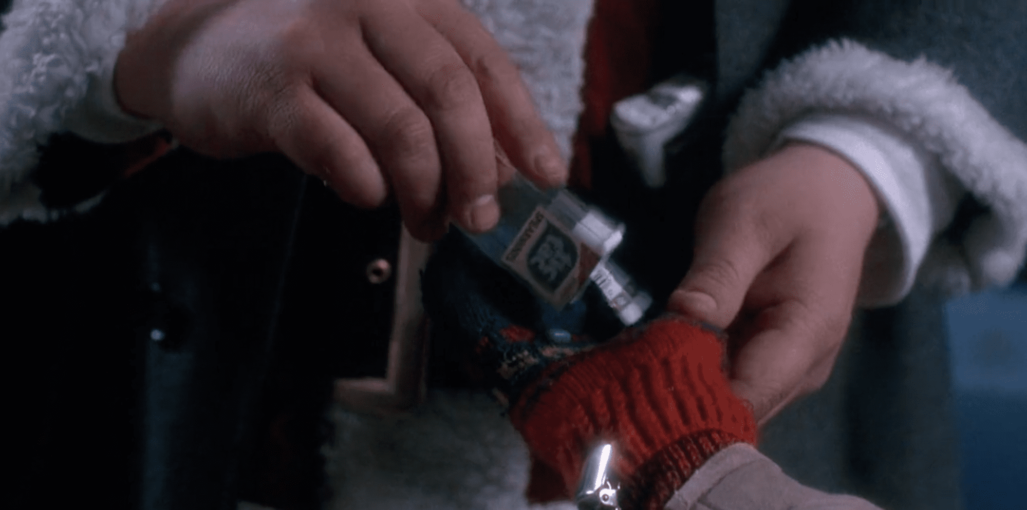 Santa Claus gives Kevin tic tacs in Home alone